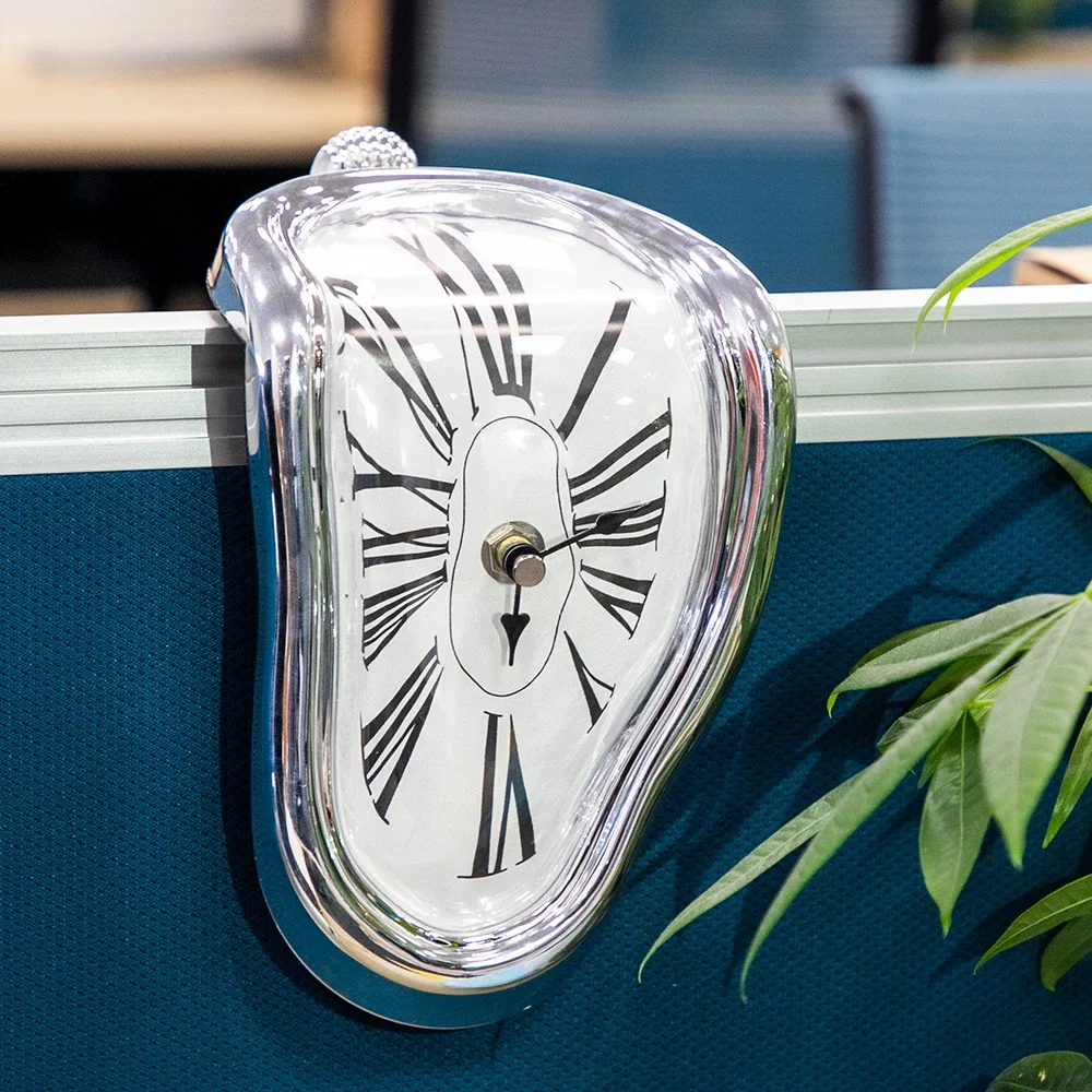 Horloge déformée style Dali 18 cm