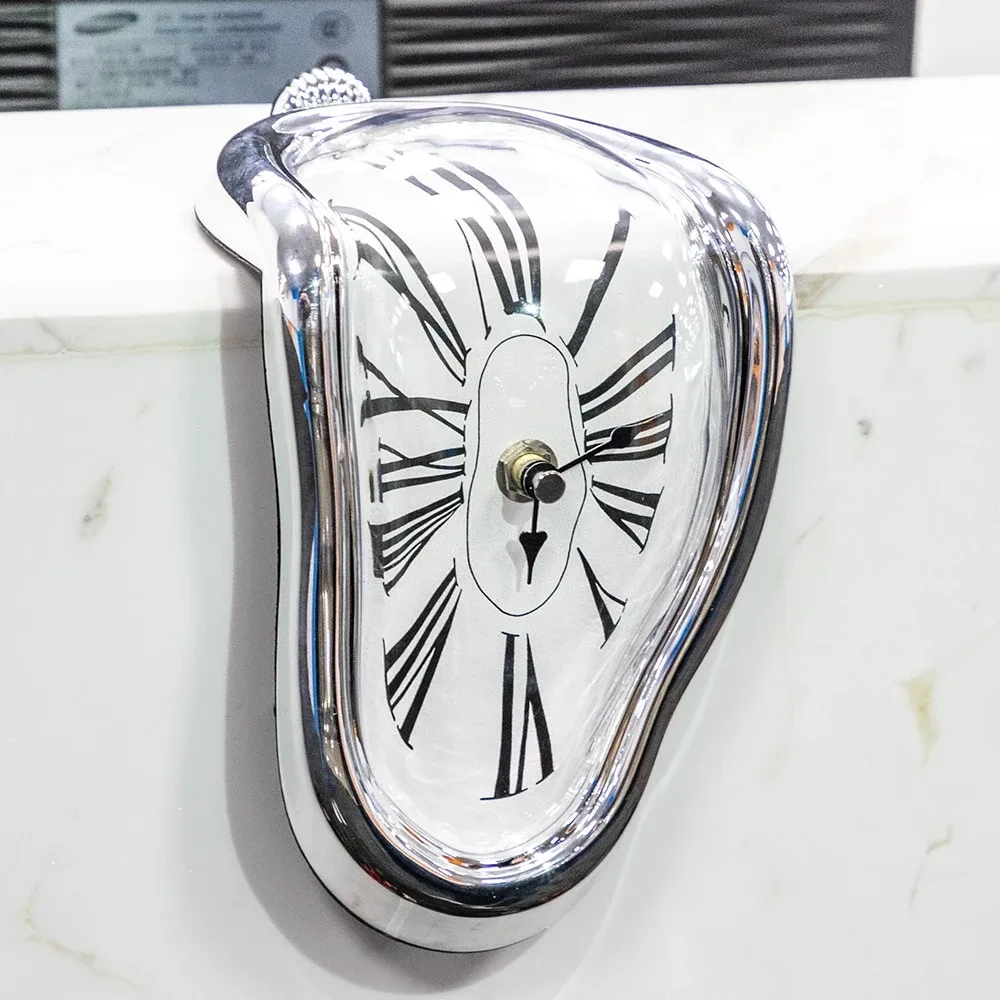 Horloge déformée style Dali 18 cm