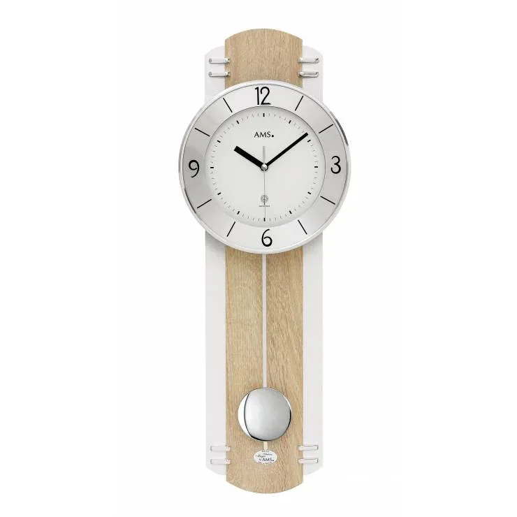PENDULE DESIGN A BALANCIER RADIO PILOTEE - 5291 — image 1
